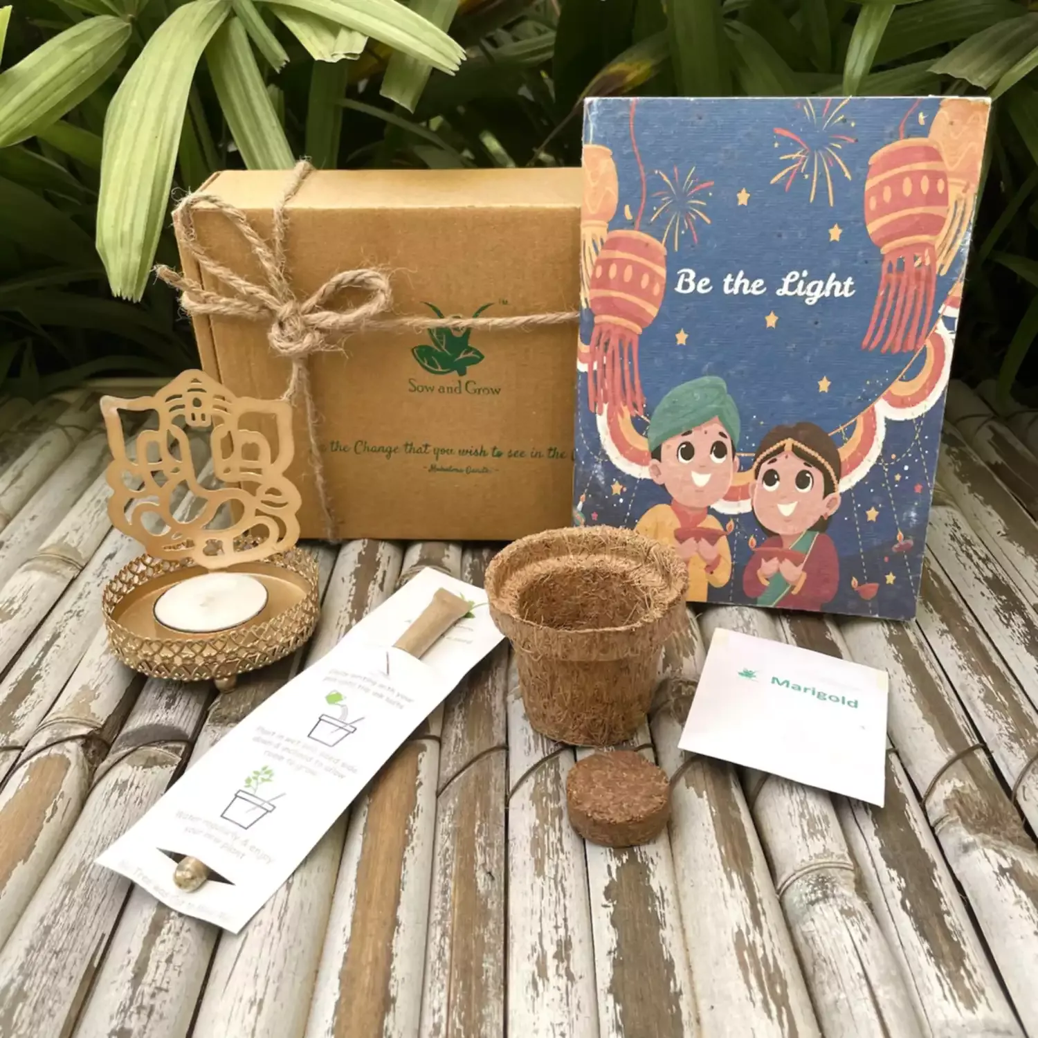 Sow and Grow Ecofriendly Assorted Hamper: Plantable Diary + Seed Pen + Marigold Grow Kit + Shadow Tealight Holder