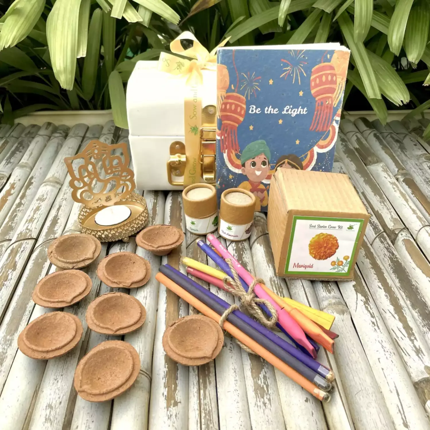 Sow and Grow Metal Trunk Hamper 1: Shadow Diya, Cow Dung Diyas, Mini Grow Kit, Seeds, Plantable Stationary