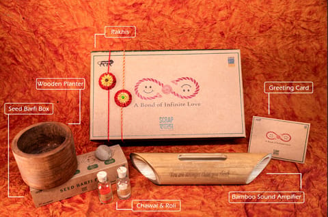 Scrapshala Akkad-Bakkad Rakhi Gift Box | Set of 2 plantable rakhi | Bamboo speaker | Wooden planter | Planting material | Roli-Chawal | Seed ball | Greeting card | Handmade in Banaras